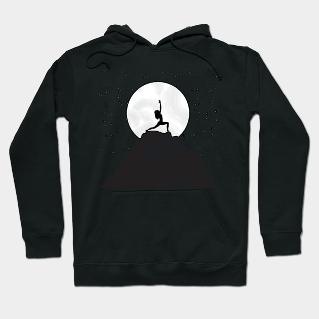 Woman doing exercise on a mountain top Hoodie by All About Nerds